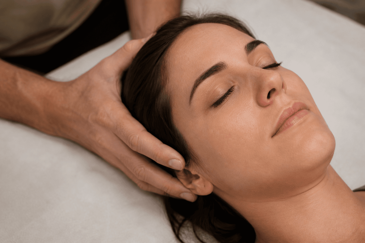 Hands at work in a craniosacral session